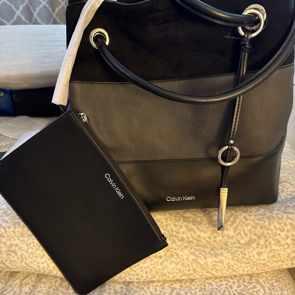 Brand new Calvin Klein Bag with pocket book